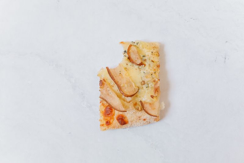 Caramelized onion and goat cheese pizza